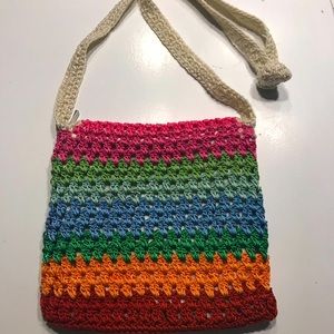 Crocheted multi colored shoulder bag.